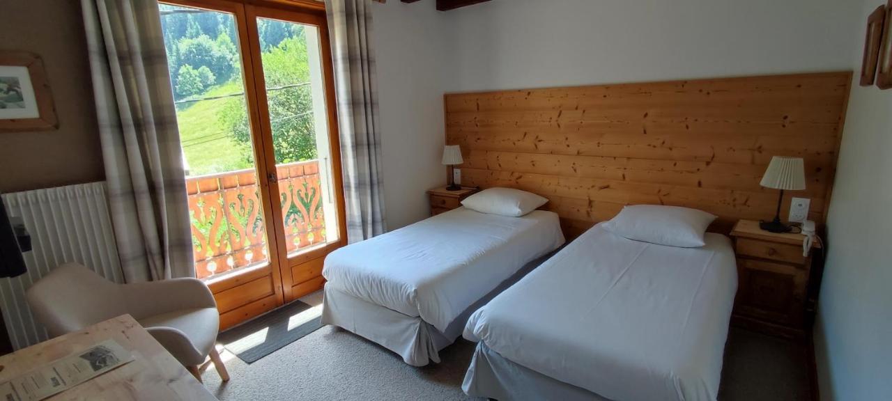 Le Taconet Hotel Le Praz de Lys Szoba fotó